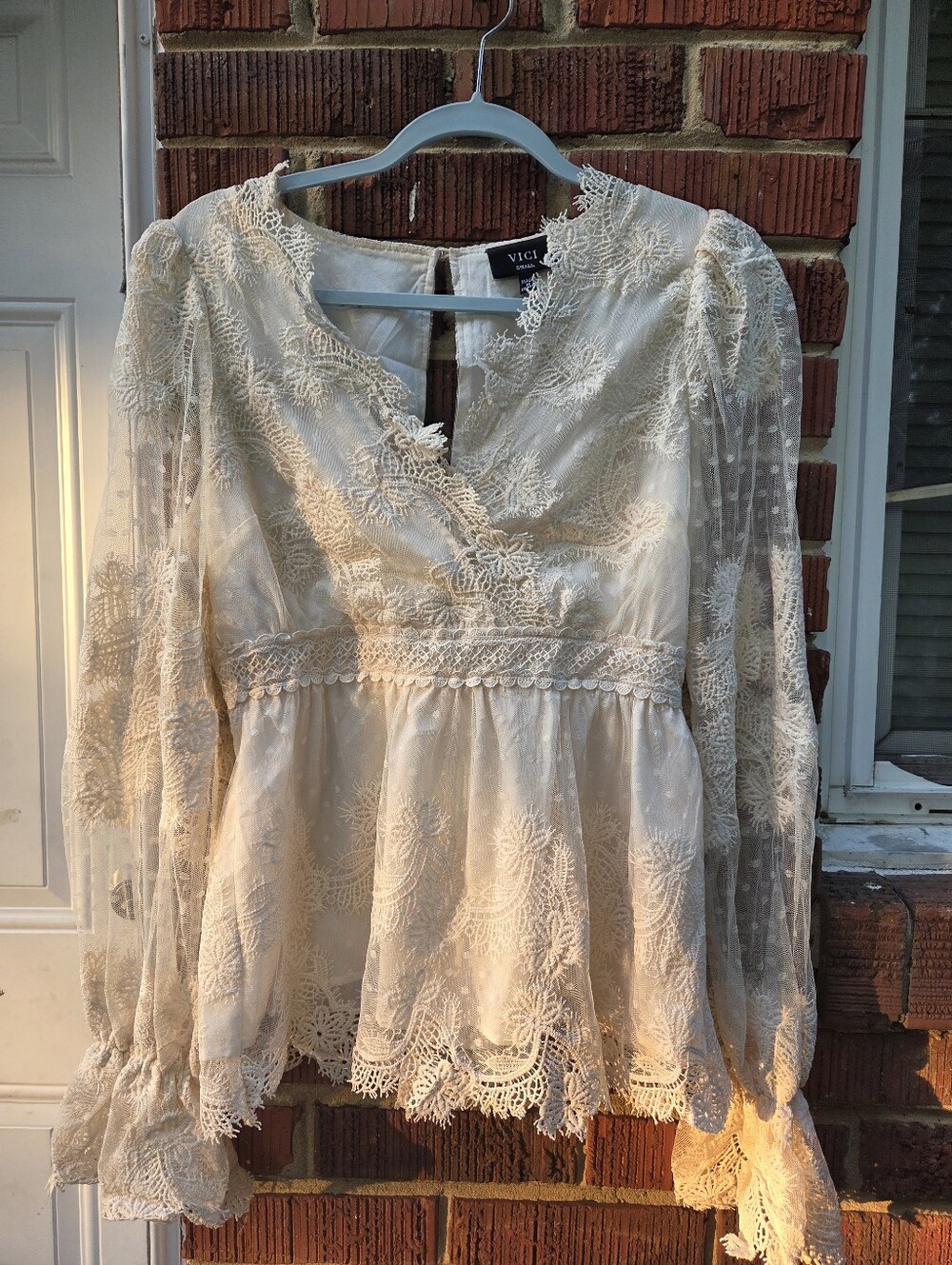 VICI Lace Peplum Blouse in Cream